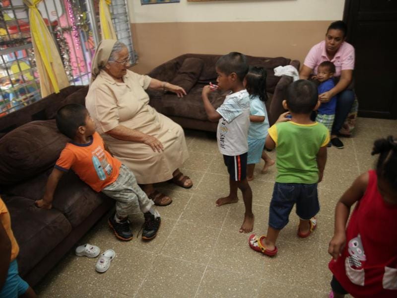 Sister Lourdes with children at the Malambo Orphanage